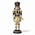 Nutcracker figure decorative piece in navy and gold 15 x 10 x 30cm